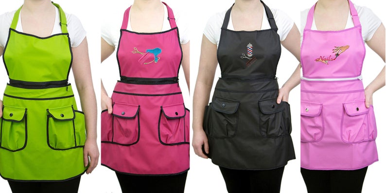 alt="green red black pink groomer aprons"