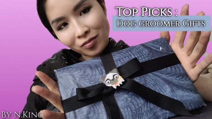 alt="dog groomer holding gift box"